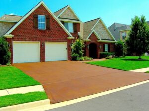 Enhance Your Home's Curb Appeal with a Coloured Concrete Driveway